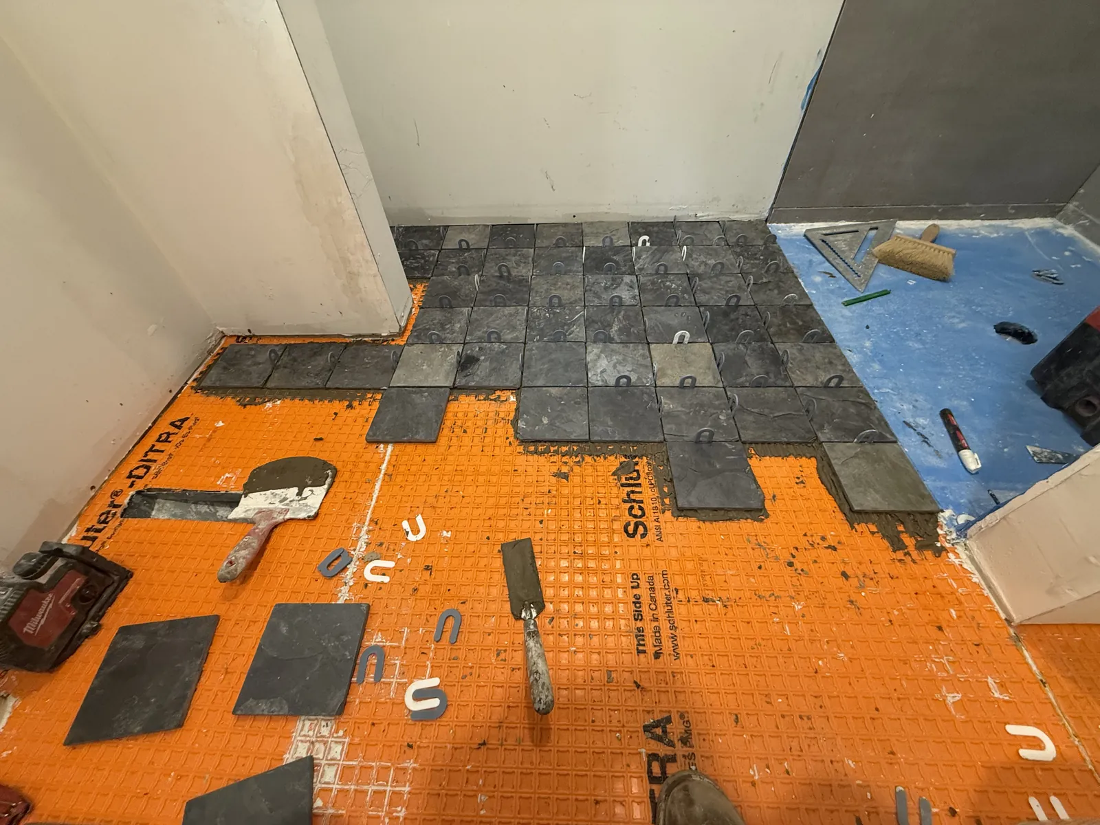 Tile work in progress on a custom shower remodel